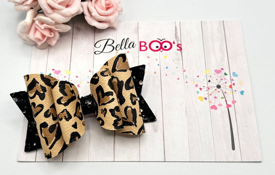 Load image into Gallery viewer, Leopard Heart Print Hair Bow
